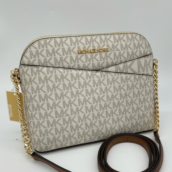 Michael Kors Handbags - Michael Kors Medium Dome Xcross Xbody Bag Vanilla